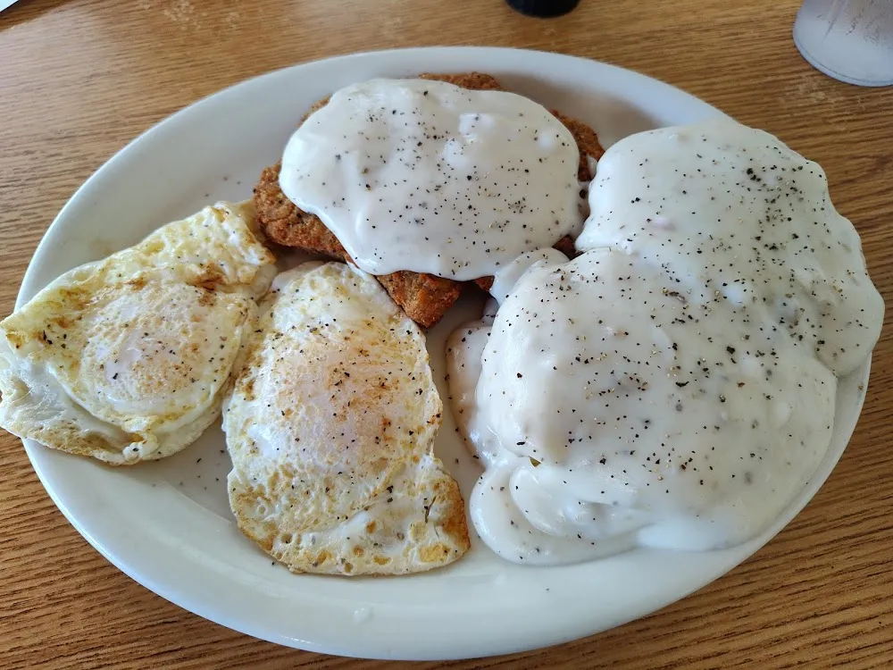 Chicken Fried Steak and Eggs with Biscuits and Gravy